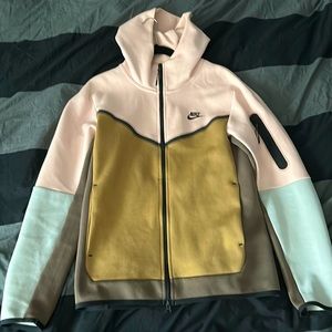 Pink and brown Nike Tech